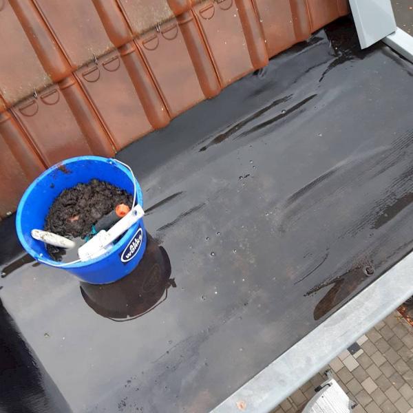 Afwassen dakgoten en rolluiken