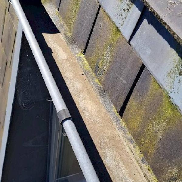 Afwassen dakgoten en rolluiken